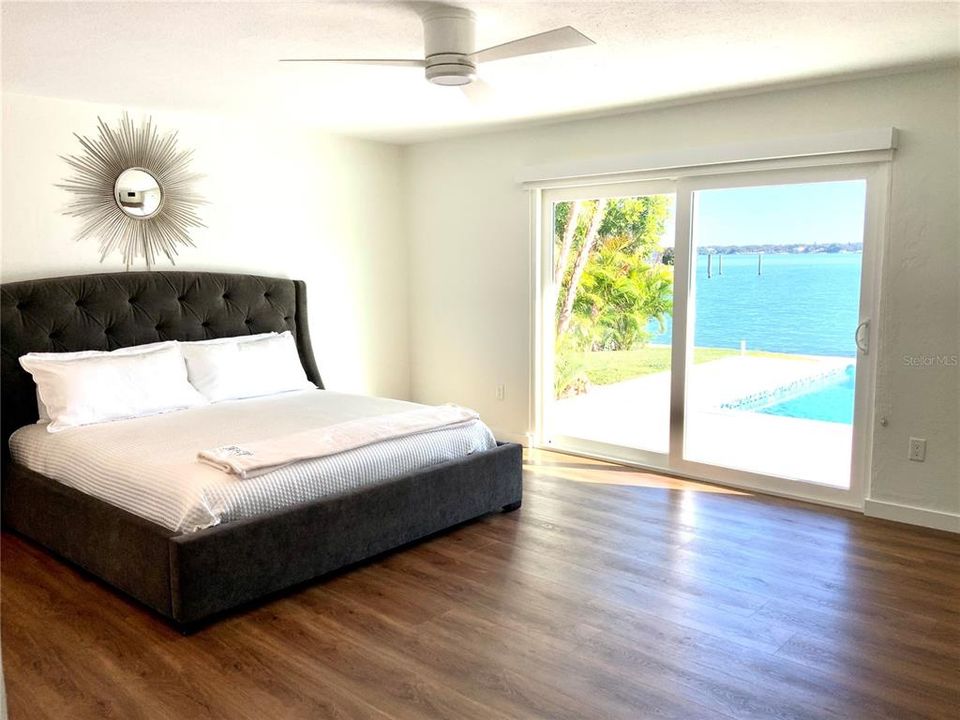 Master bedroom downstairs with amazing water views