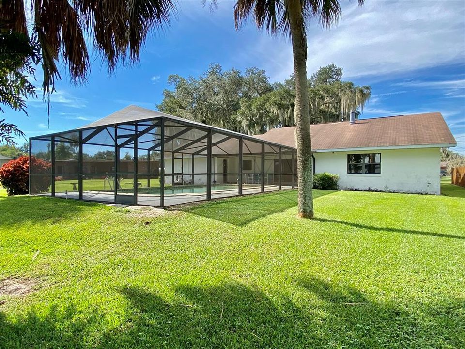 Back of home and pool enclosure