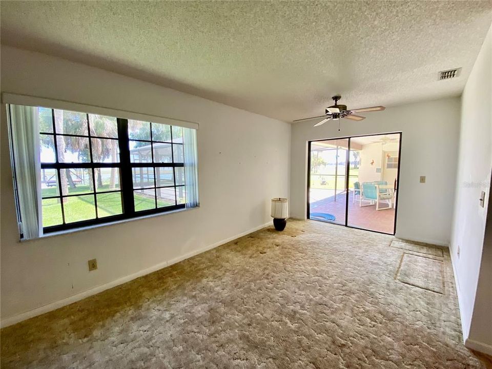 Master bedroom & view of Lake & pool