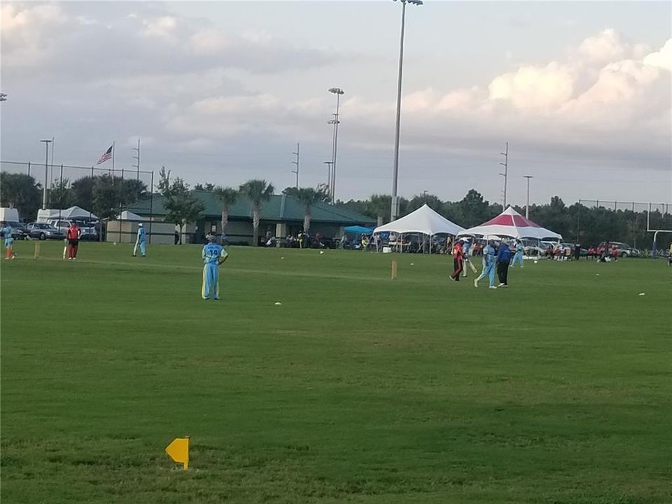 Cricket game at one of Poinciana Parks