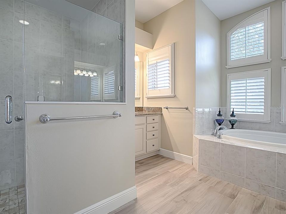 TILED SHOWER WITH FRAMELESS GLASS DOOR!