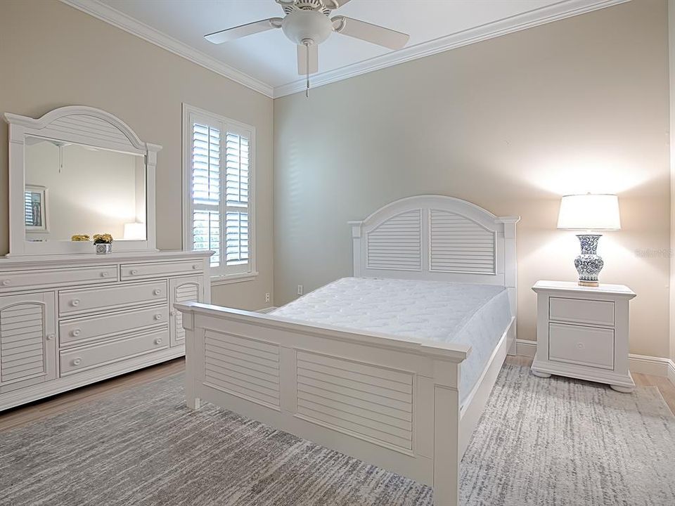 2ND GUEST ROOM HAS CROWN MOLDING AND PLANTATION SHUTTERS!  AND THE SAME PORCELAIN TILE FLOORING!