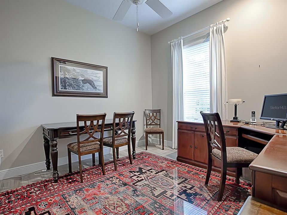 POCKET DOOR OFF OF THE HALLWAY BEHIND THE KITCHEN LEADS TO THE GUEST SUITE!  THE FRONT GUEST ROOM IS BEING USED AS AN OFFICE!