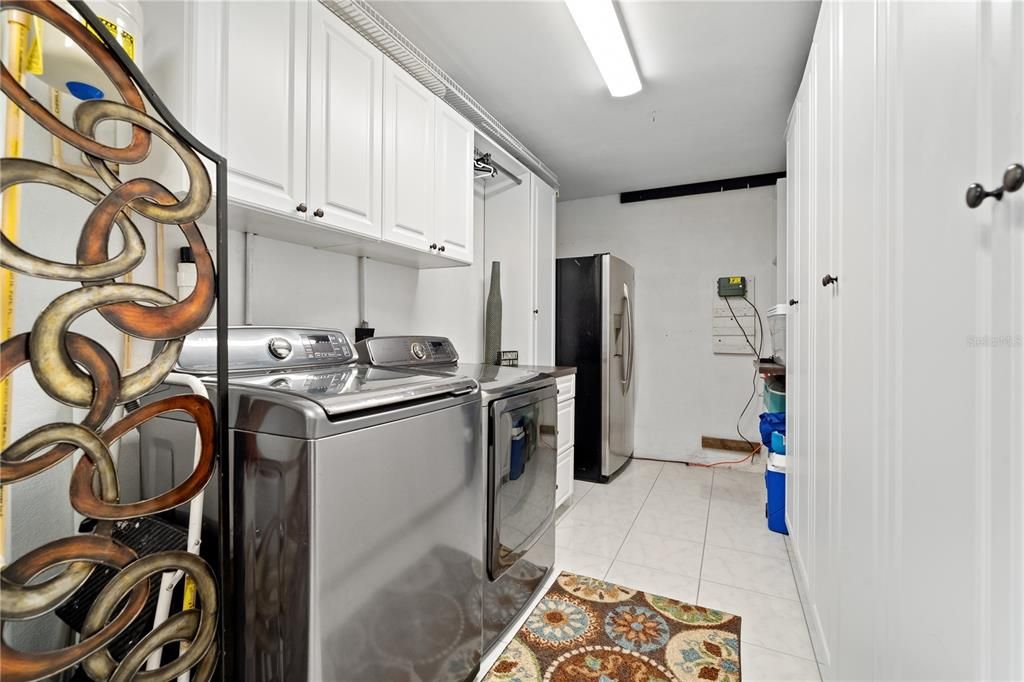 Efficient Laundry/Utility room with storage galore!