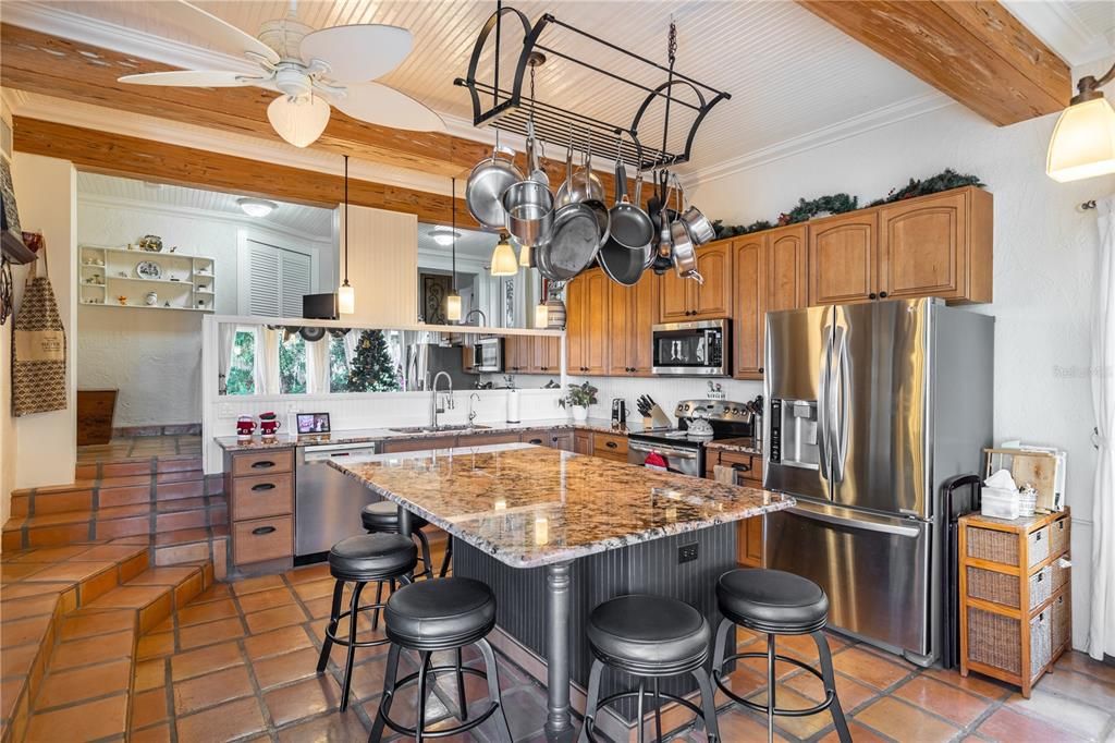 Renovated Kitchen with Stainless Steel Appliances and Large Island with Seating