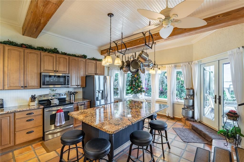 Renovated Kitchen showing French Doors to Pool, Deck and Garden Area