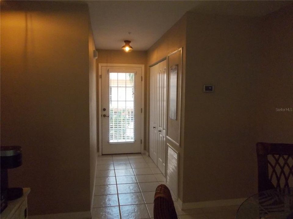 Looking at front door from dining room table.