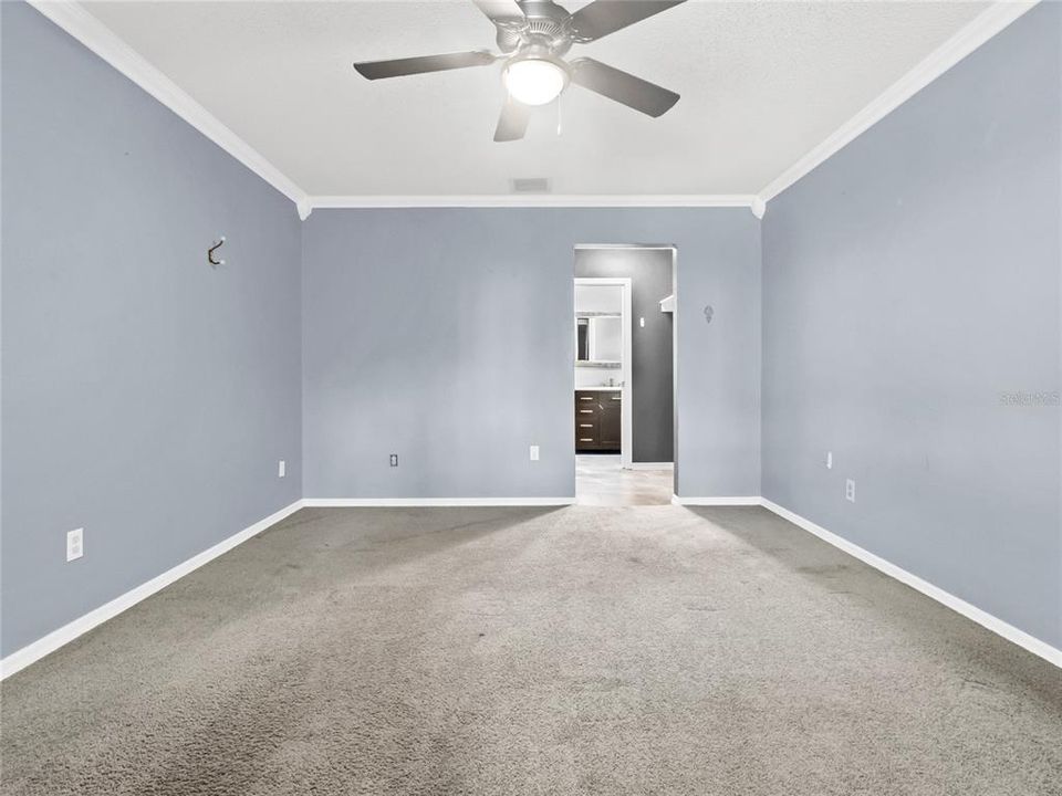 Master bedroom with view to master bath