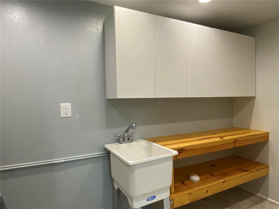 Laundry room sink and storage