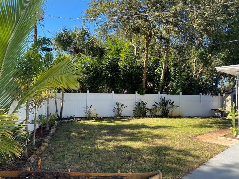 Spacious backyard with PVC fencing