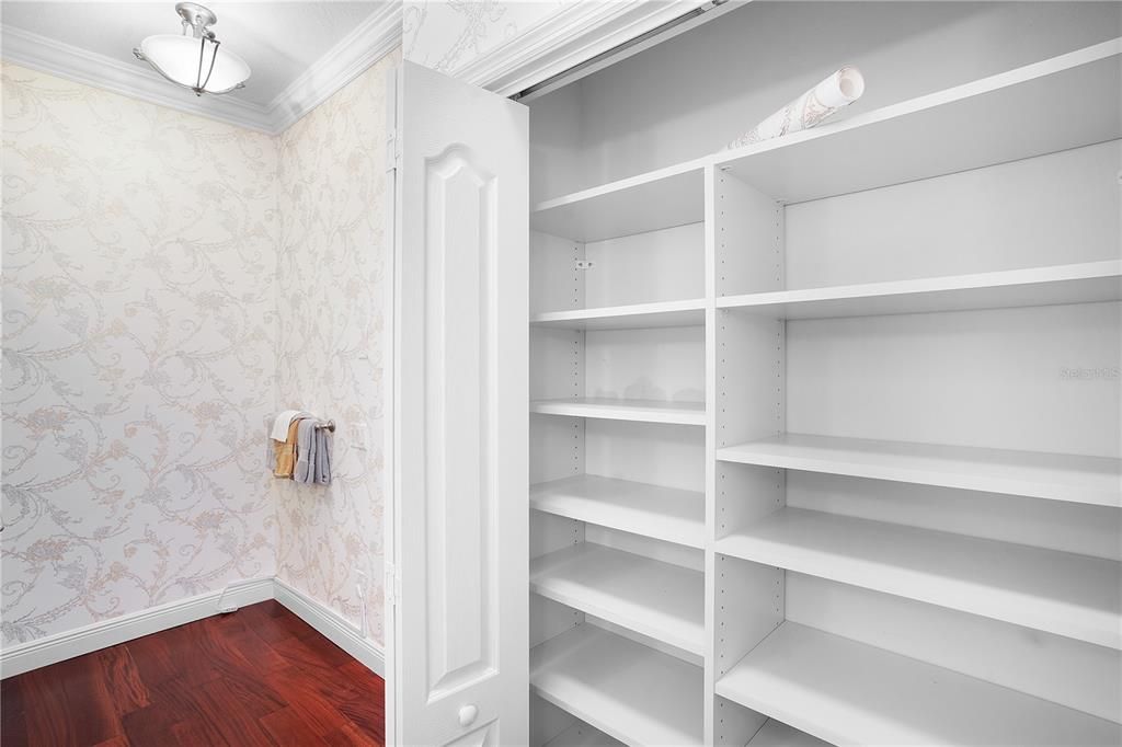 Linen closet in guest bath