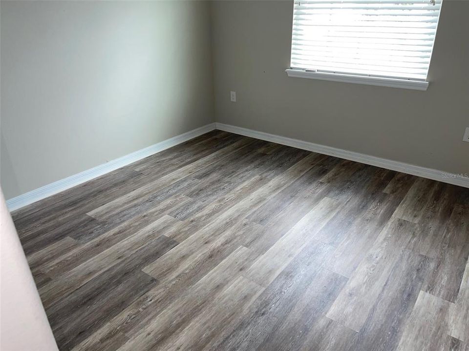 MASTER BEDROOM VINYL WOOD FLOOR