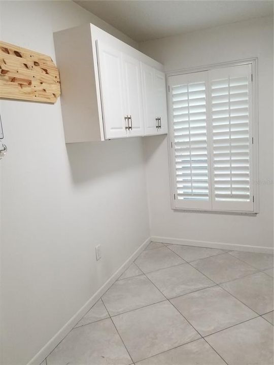 Laundry Room offers storage and a deep sink