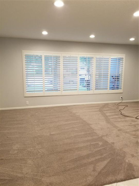 The Large Living Room has Bahama shutters for privacy