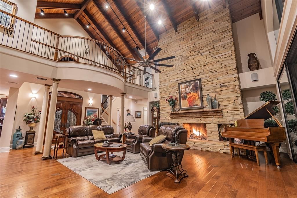 2-Story Stacked Stone Floor-t0-Ceiling Great Room Center Piece