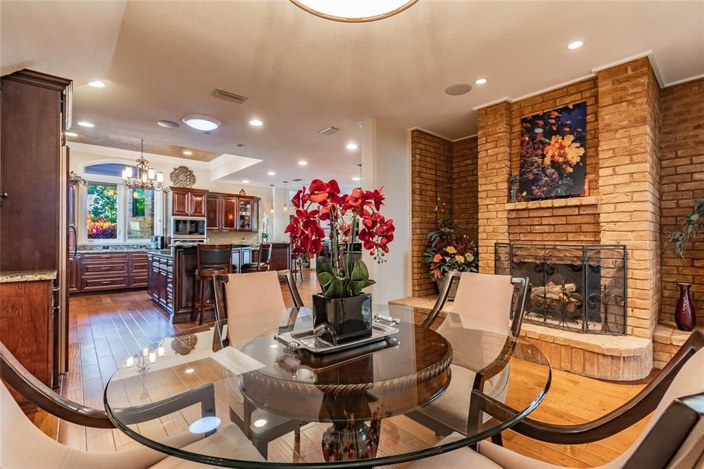 Huge Family Dinette with 3rd Brick Fireplace