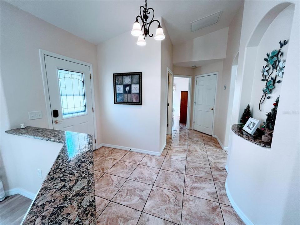 Foyer with large Ceramic Tile