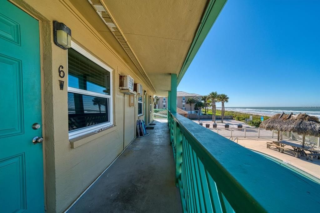 6W is located upstairs and provides great views of the pool to the sandy beaches.