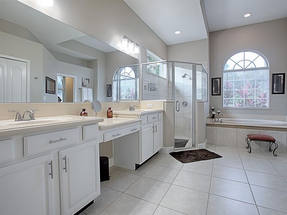Master Bathroom, Dual Vanities, walk-in closest and a water closest.