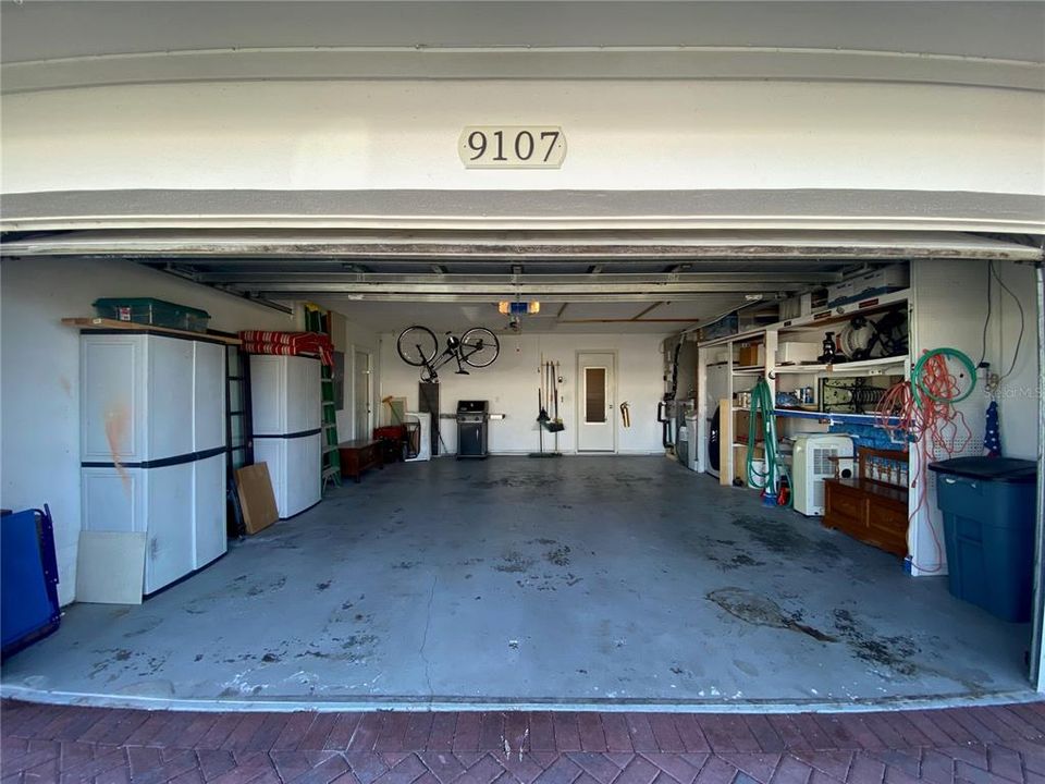Front View of spacious 2 car garage with tons of storage