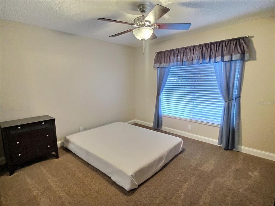 Guest bedroom with brand new carpeting
