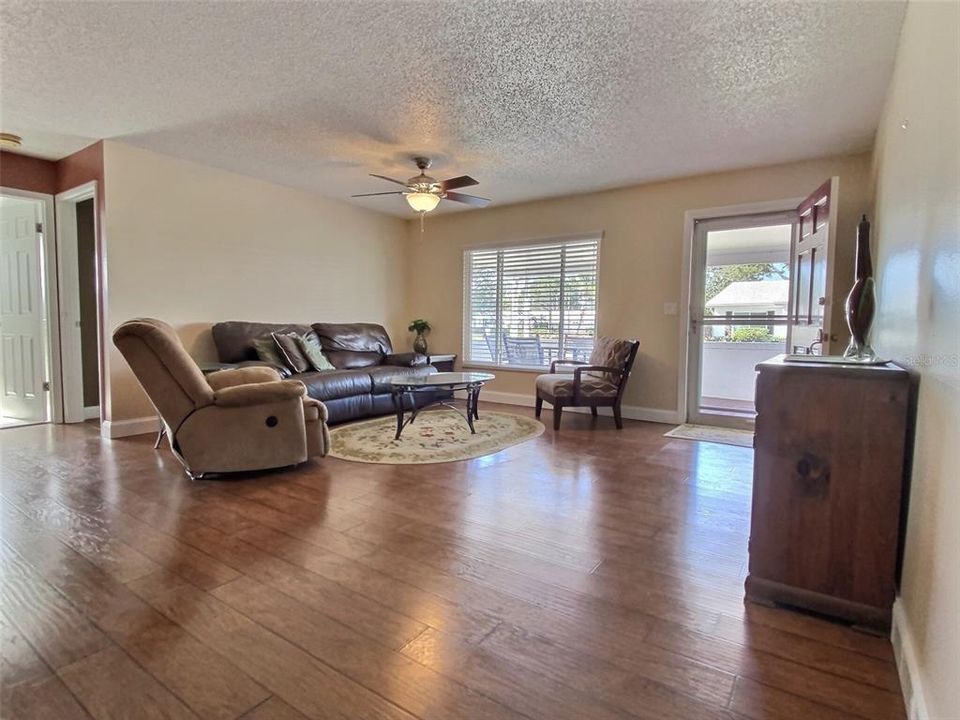 Gleaming Floors and spacious front living room