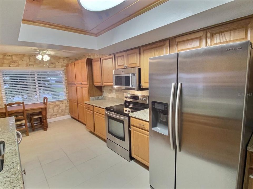 Granite Countertops, Solid Wood Cabinets & stainless appliances
