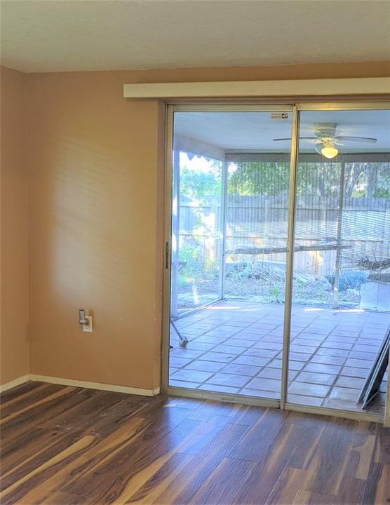 Sliding glass doors in Florida Room to Rear Screened in patio.