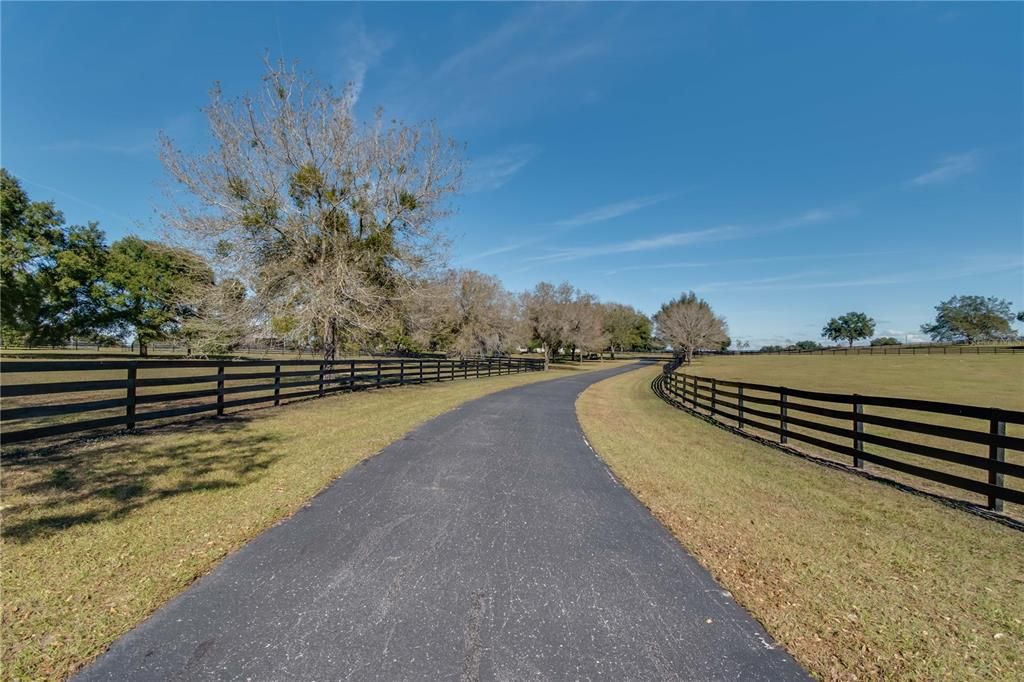 paved driveway with electronic gate from Marion County Road
