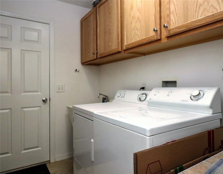 Laundry room is inside, right off the kitchen