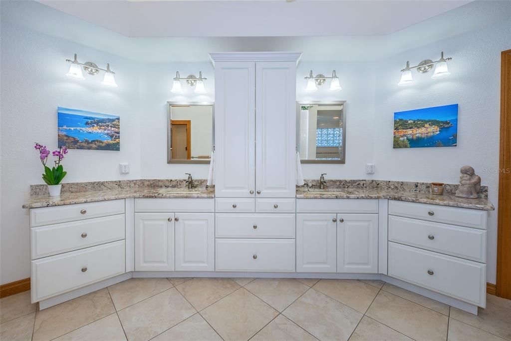 Master bathroom with double sinks and granite counters