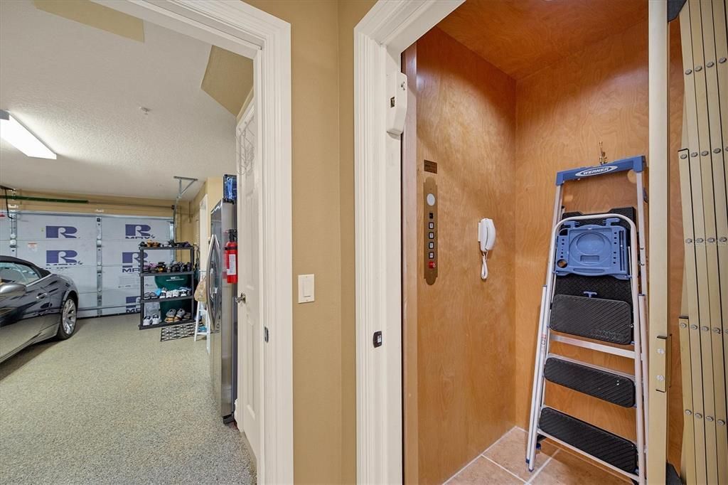 Private elevator is shown here in on the ground floor.  It is just a step away when you drive in your 2-car garage.