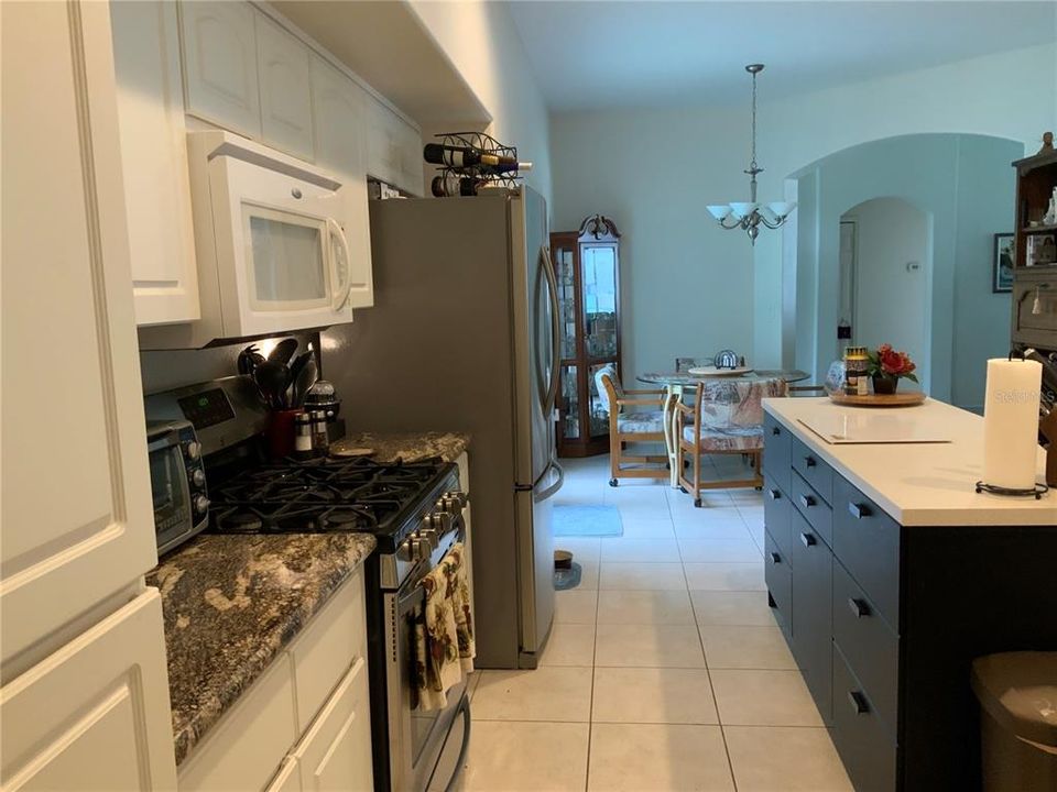 Kitchen has abundant storage and counter space.