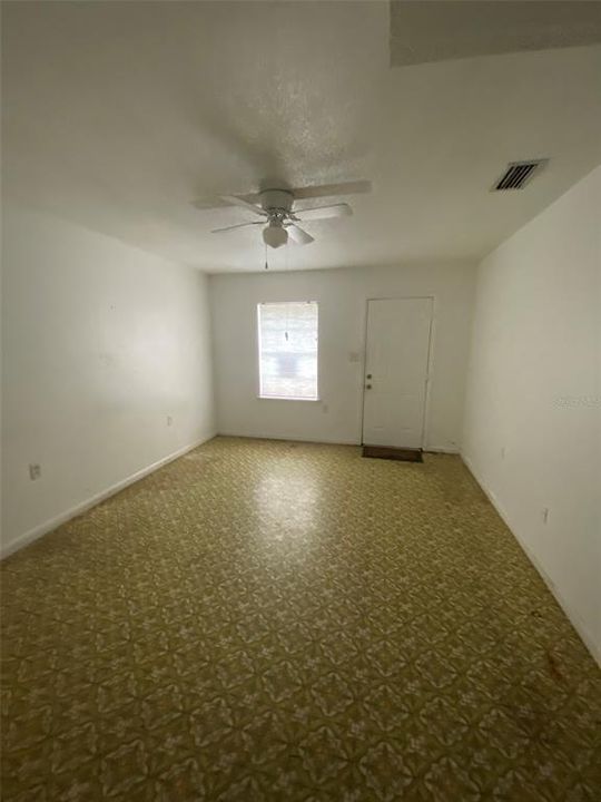 Downstairs Bedroom / In-Law. Located Between Kitchen and Garage