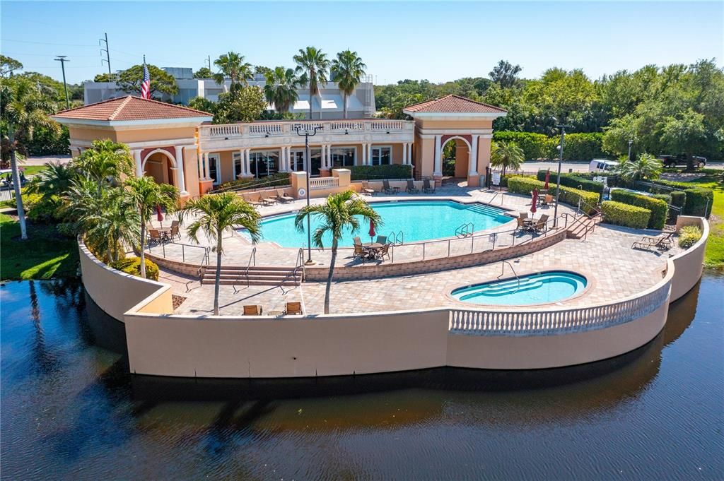 Beautiful geothermally heated pool with large hot tub on lower level at Clubhouse.