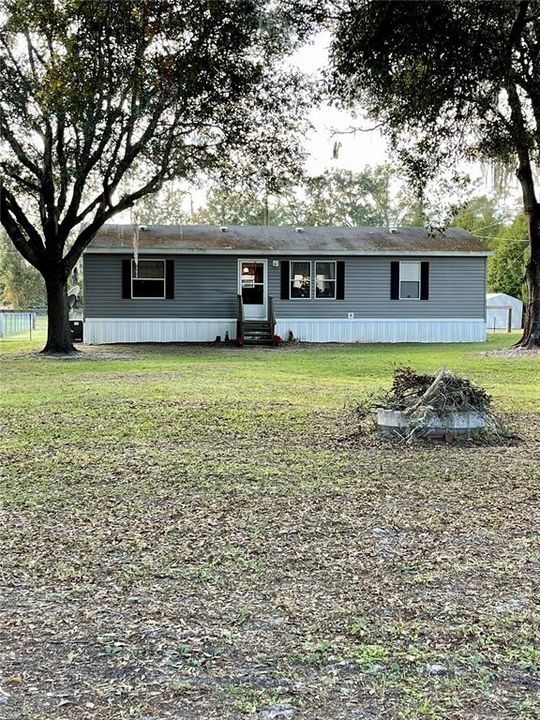 Front of home and fire pit