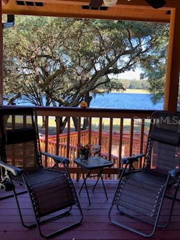 LOUNGERS OVERLOOKING LAKE