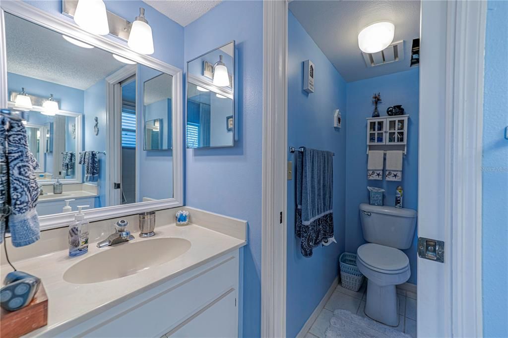 En-suite bathroom with dual sinks