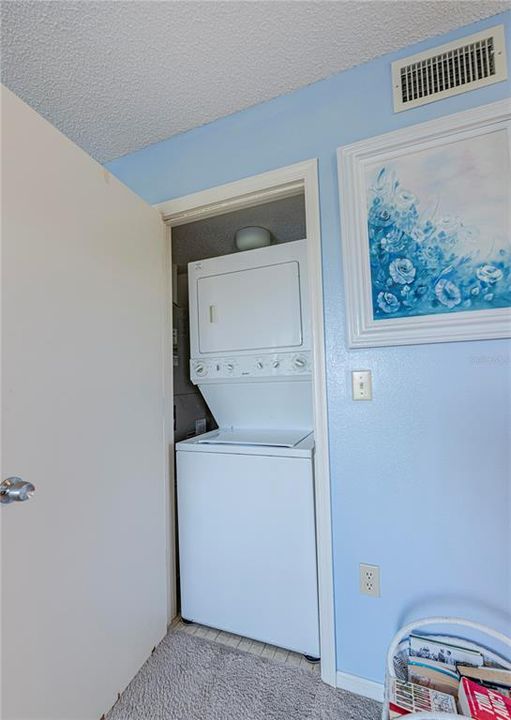 Laundry room closet in master suite