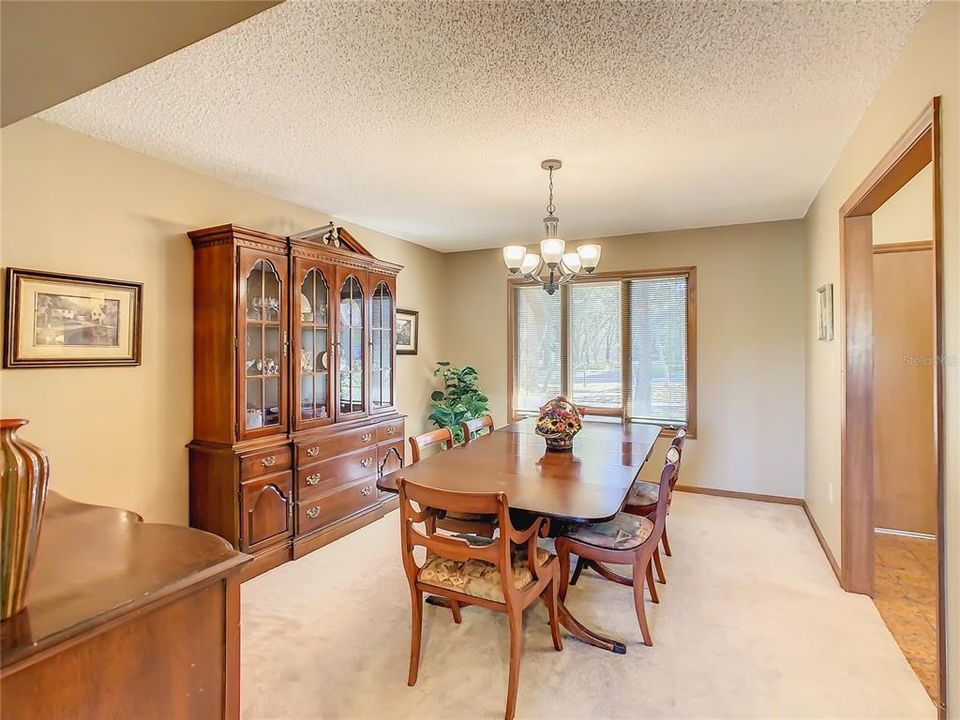 Look at the size of this dining room - 15' x 17'.  Plenty of room for china cabinets, buffets and all the extra leafs in your table to accommodate your next family gathering.