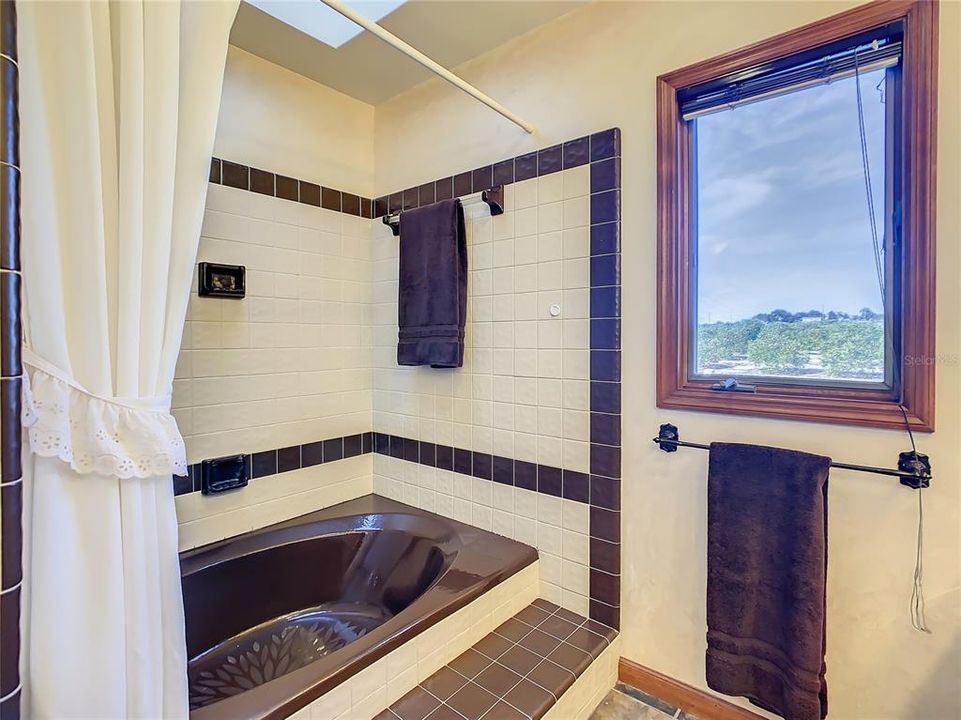 Soaking tub with shower.