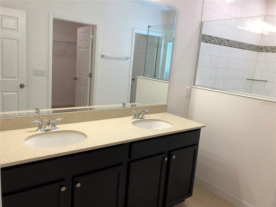 Main Bathroom with dual vanities.