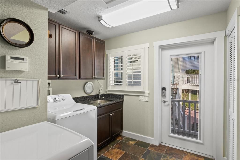 Laundry room - more cabinets and sink