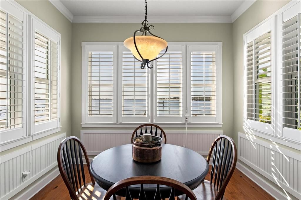 Breakfast nook with windows on 3 sides