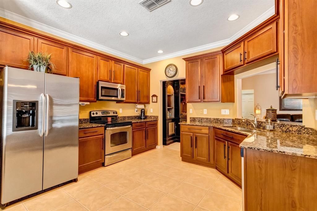 Kitchen W/Wood Cabinets and Granite Countertops