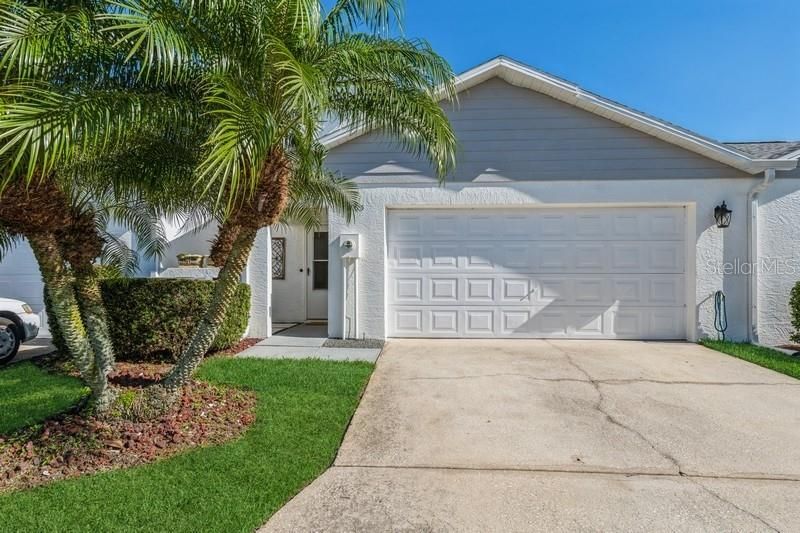 Maintenance Free Front Yard and Home Exterior. New Paint and Roof.