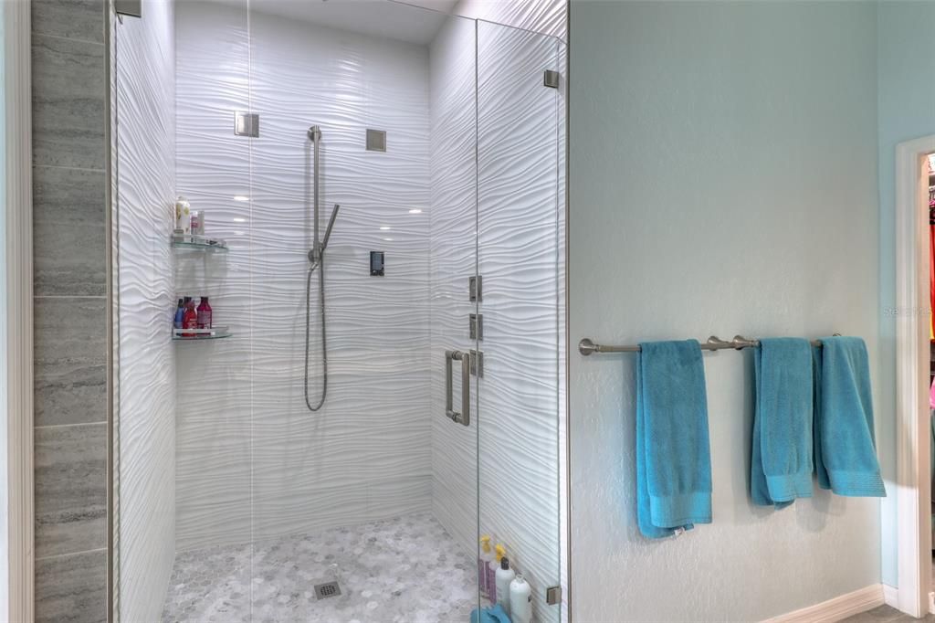 Master shower with body jets, temp/music controls