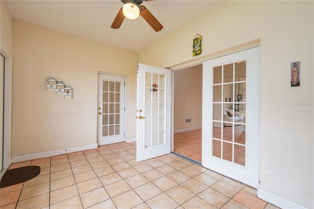 Bonus room with entry off master bedroom and French doors leading to the family room.