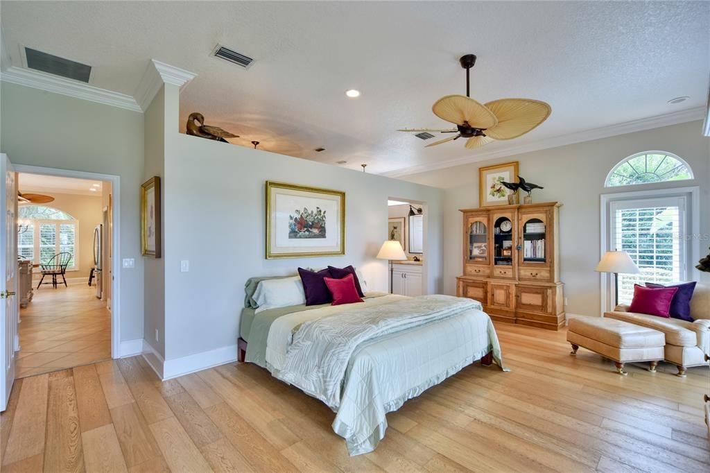 Large Master Bedroom with High Ceilings and Crown Molding