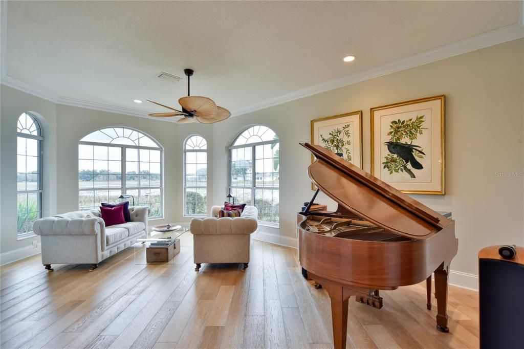 Living Room with 4 Palladium Windows, Eyebrow Dormers and Beautiful Views